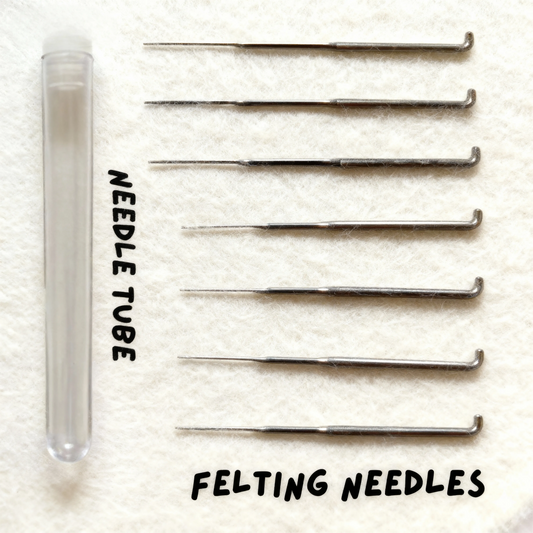 Seven felting needles in mixed sizes with a clear storage tube from Joypok