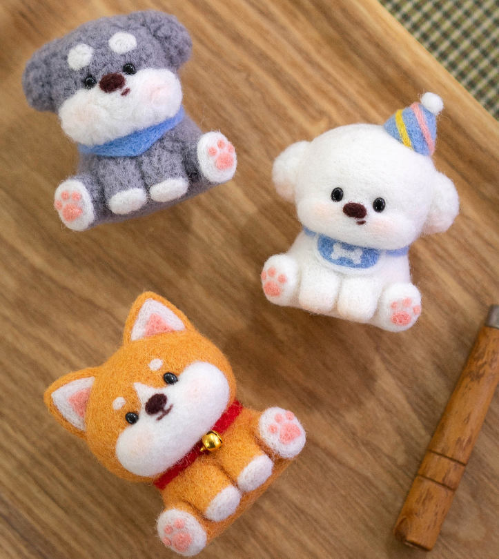 Finished Puppy pals felt dogs close-up.