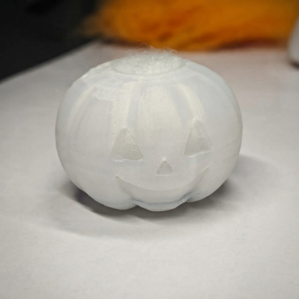 The No-Fail Core™ — a soft translucent silicone pumpkin form used inside the needle felting kit