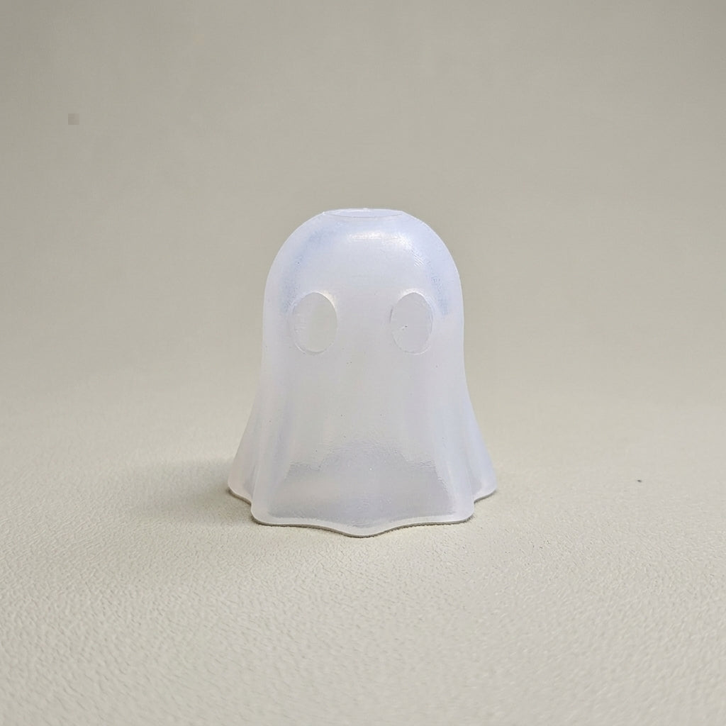 The No-Fail Core — a soft translucent silicone inner form in the shape of a ghost, used inside the felting kit