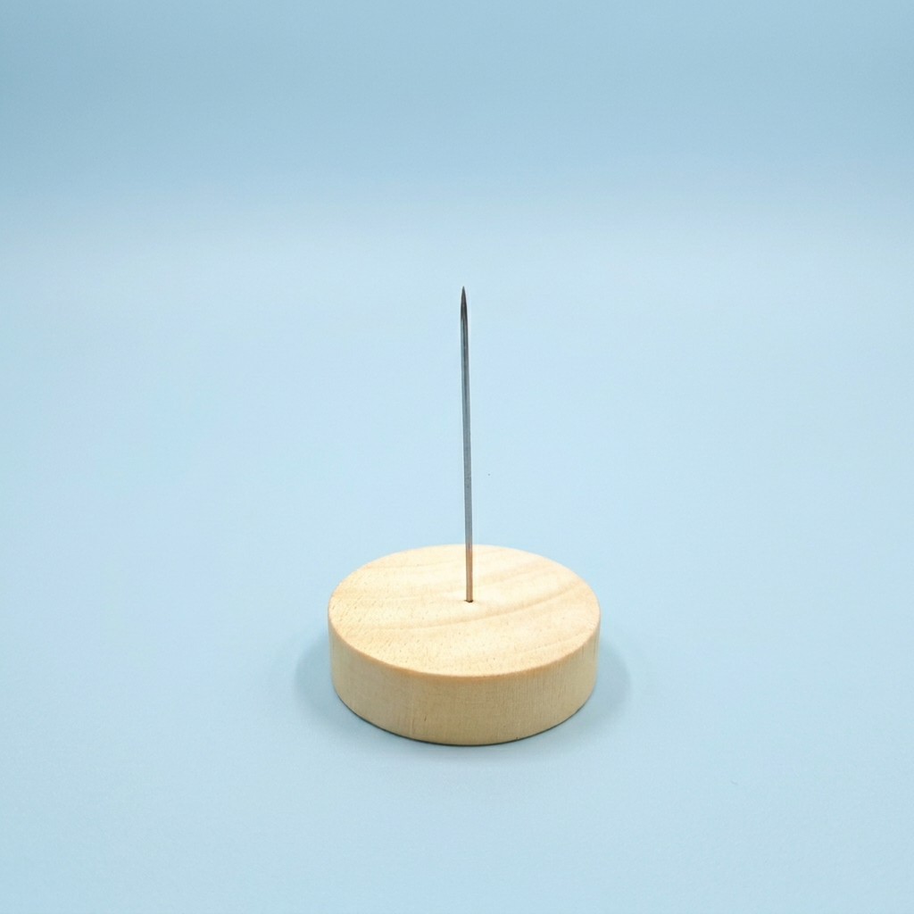 Wooden felting display base with a steel display pin from Joypok