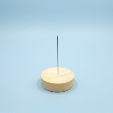 Wooden felting display base with a steel display pin from Joypok