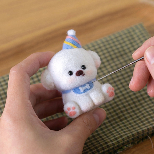 Finished Birthday Bichon felt dog front view.