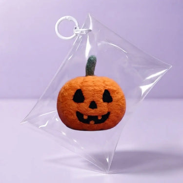 Finished Gourdon pumpkin wrapped in a clear Halloween treat bag, ready to gift
